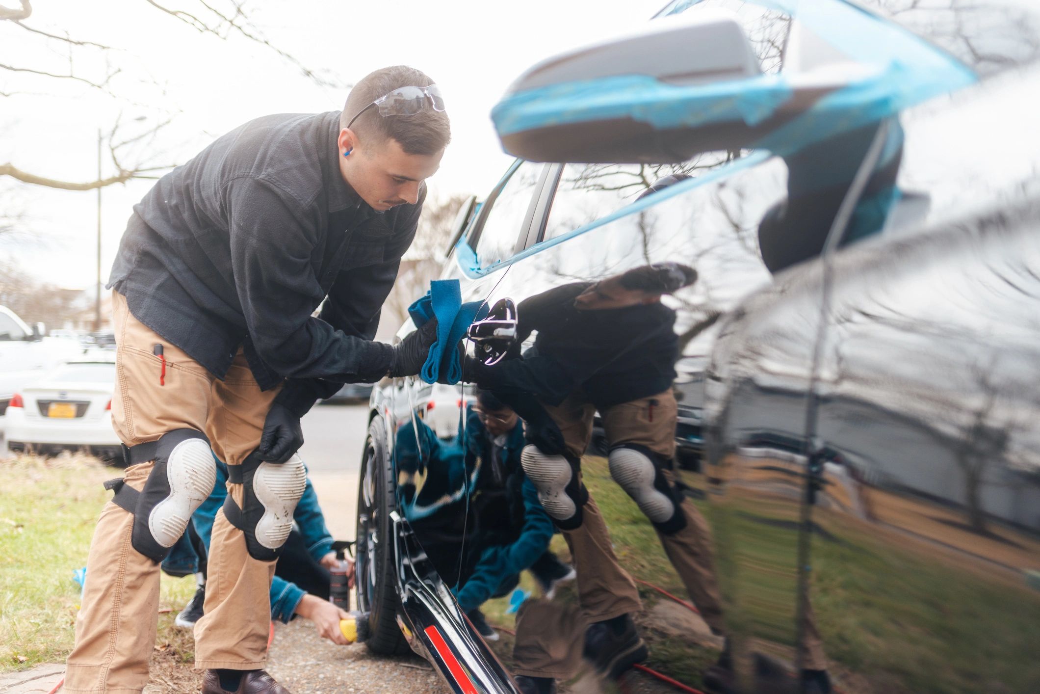 mobile auto detailing team at work